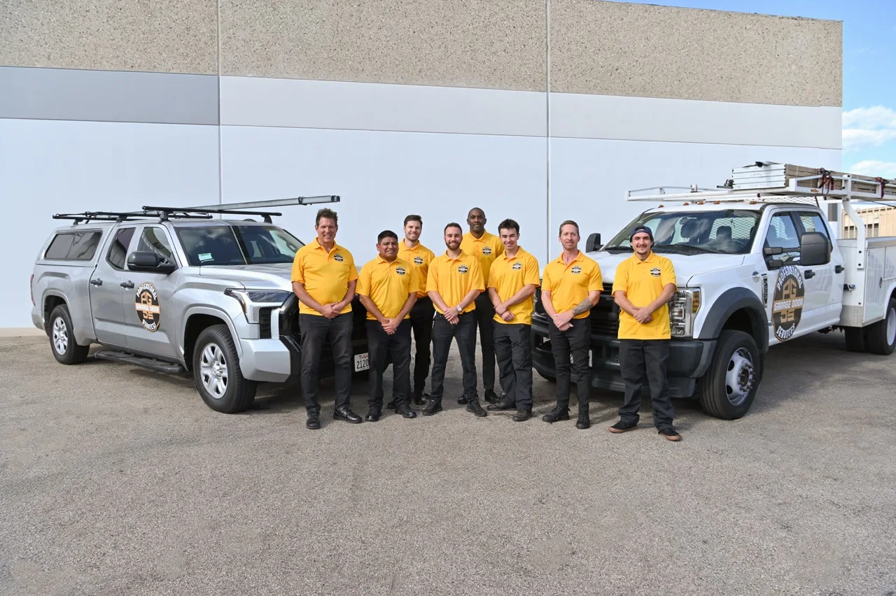 Professional Garage Door Services technicians standing by our service trucks